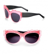 Retro cool meets sophisticated style in these textured round frames in glossy acetate. Available in fluorescent pink/black with black lens or brown with brown lens.Plastic temples100% UV protectionMade in Italy 