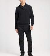 Stylishly modern, with unexpected details defines this incredibly cozy fleece pullover.Zip closureShawl collarFront slash pocketsAbout 27½ from shoulder to hem80% cotton/20% polyesterMachine washImported