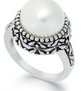 Dedicated to elegance. This beautiful cultured freshwater pearl ring (11-1/2-12mm) sits in an intricately-engraved sterling silver setting. Size 7.