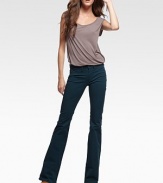 Crisp cotton twill in a flit-and-flare silhouette, finished with classic five-pocket styling.Fitted from hips through thighsZip-flyFive-pocket styleFlared legsInseam, aout 3555% cotton/42% tencel/3% spandexMachine washMade in USA of imported fabric
