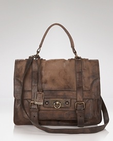 Tap into this season's boy-borrowed trend with Frye's rugged leather satchel. With a flip lock closure and handsome distressed fabrication, wear this bag for a no-frills finish. Tap into this season's boy-borrowed trend with Frye's rugged leather satchel. With a flip lock closure and handsome distressed fabrication, wear this bag for a no-frills finish.