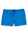 Bring a bright pop of color to your day in the sun with these classic MARC BY MARC JACOBS swim trunks.