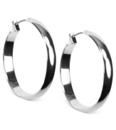 Go full circle with this set of hoop earrings from Anne Klein. Crafted from silver-tone mixed metal, the pair makes a subtle, yet bold statement. Approximate diameter: 1-1/4 inches.
