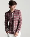 A classic pattern on soft cotton lays the groundwork for a wardrobe staple. From Burberry.
