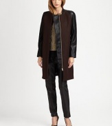 Contrasting faux leather sleeves add a colorblock effect to this wool-rich, A-line jacket. RoundneckLong faux leather sleevesHidden button frontSlash pocketsFully linedAbout 36 from shoulder to hem80% wool/20% nylonDry cleanImportedModel shown is 5'10 (177cm) wearing US size 0.