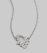 Encrusted with a wealth of shimmering Swarovski crystals, the elegant Dior logo is set on a graceful chain. Crystal Silvertone Length, about 15¾ Spring clip clasp Imported