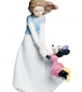 Minnie Mouse and a friend go for a spin in this sure-to-be-cherished Disney collectible, handmade in Nao by Lladro porcelain.