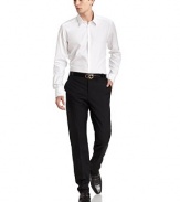 THE LOOKSlim fit silhouetteTonal pinstripe designShirt collarFront button closure Long button cuff sleeves Shirttail hemBack yoke and seam detailsTHE MATERIALCottonCARE & ORIGINMachine washMade in Italy