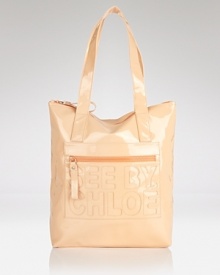 Label-loyalty takes a sleek turn with this ultra-shiny patent tote that works a logo-embossed look from See By Chloé. Label-loyalty takes a sleek turn with this ultra-shiny patent tote that works a logo-embossed look from See By Chloé.