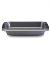 Take a no-nonsense, nonstick approach! Bake, braise and roast like a pro with the versatile Anolon 9 x 13 rectangular cake pan. New proprietary coating ensures superior release and makes cleanup a snap. Silicon-enhanced handles are steady and slip-free, while the pan's substantial weight provides durability and helps prevent warping.