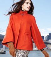 Betsey Johnson mixes sixties style with contemporary flair. The swingy fit and bold color make this topper a fashion-forward choice!