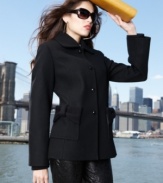 A cuter way to stay cozy this fall: Betsey Johnson gives a classic black coat a feminine makeover, complete with oversize bows on the pockets!