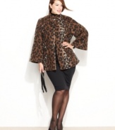 A chic trapeze silhouette creates a plus size topper with vintage-inspired chic and contemporary appeal, from Betsey Johnson. Available in black or a wildly stylish leopard print.