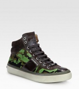 A perfect choice for the hot stepper with high style, this lace-up classic is remarkably crafted in camo-printed pony hair with leather panel details.Pony hair upperLeather liningPadded insoleRubber soleMade in Italy