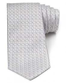 Bright color is balanced by the classic shape and design of this exceptionally soft tie, rendered in premium Italian silk for a luxurious addition to your fine dress shirting. Bright color is balanced by the classic shape and design of this exceptionally soft tie, rendered in premium Italian silk for a luxurious addition to your fine dress shirting.