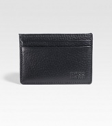 A slim-line credit card holder in pebbled leather with a debossed logo detail. Two card slots3¼ X 2¾Imported