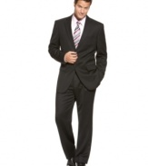 A sleek, dark suit is the one staple of a man's wardrobe that will always be in style.