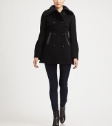 Offering a dash of military style, thanks to its gunflaps and rainflaps, a double-breasted wool-cashmere jacket with a hint of stretch.Oversized collarGunflapsDouble-breasted styleLeather welt pocketsButton tab on rainflapFully linedAbout 29 from shoulder to hemWool/polyamide/cashmereDry clean by leather specialistImportedModel shown is 5'9 (175cm) wearing US size Small. 