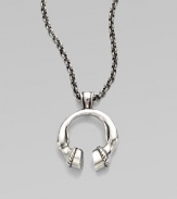 An unique design with a U-shaped horse hoof pendant on a link chain. SilvertoneLength, about 30Pendant size, about 1½Slip-on styleMade in USA