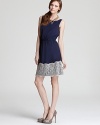 An easy Aqua dress is decorated with delightful lace at the skirt for a charming look with ladylike appeal.