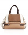 This gorgeous bag by Furla exudes an effortless chic, making it perfect for work or play. Polished goldtone hardware and a mix of flat and textured leathers make this sleek dome purse a modern girl necessity.
