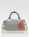 Roomy, structured and sporty carryall crafted from laminated canvas with rich leather trim.Double top handles, 5 dropRemovable shoulder strap, 20 dropTop-zip closurePatent leather key-chain pouchOne inside zip pocketThree inside open pocketsCotton lining12½W X 8H X 7DImported