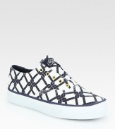 Sporty canvas essential in a lattice-like print, finished with a modern laceless front and rubber sole for traction. Rubber platform, 1 (25mm)Canvas upperCanvas liningRubber solePadded insoleImported