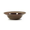 A simplistic and versatile assortment of dinnerware with just a touch of design interest! Montauk has a dual finish surface of glazed interior and matte rim that lends this everyday pattern to be anything but dull. Each item is available in 4 colors - Black, Brown, White & Tan - to layer and style your table in tonal neutrals.