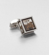 Inspired by the tale of Pandora's box in Greek mythology and featuring the Tateossian signature element of surprise, this glass-box cuff link holds pieces of genuine dinosaur bone. The Dinosaur Bone consists of a collection of Edmontosaurus Annectens bone pieces from a femur that dates back to the late Cretaceous Period about 65.5 millionyears ago. 