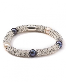 White and gray pearls are a cool contrast to sterling silver on this stretch bracelet from Links of London. Resist the urge to stack, this bangle makes a solo statement. White and gray pearls are a cool contrast to sterling silver on this stretch bracelet from Links of London. Resist the urge to stack, this bangle makes a solo statement.