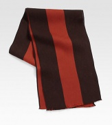 Handsome stripe design, crafted in a luxurious blend of Italian wool and silk, lends warmth and sophistication to your seasonal wardrobe.Fringed ends12W x 70L98% wool/2% silkDry cleanMade in Italy