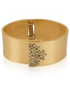 A touch of glass goes far in this bangle from Kenneth Cole New York. Crafted from gold-tone mixed metal, the bracelet is adorned with pave glass crystal accents for a fashion infusion. Approximate diameter: 2-3/8 inches.