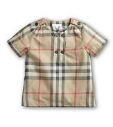 Teach little ones to appreciate classic design at a young age with timeless British cool from Burberry--the Tyra blouse features clean lines, charming button details and the brand's signature check print.