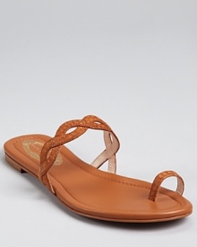 A graceful twist in luxe leather--these charming sandals from Elie Tahari boast feminine style with simplistic appeal.