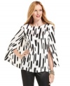 The silhouette of the season -- the cape -- makes for a truly special blouse from Nine West. Perfect for partnering with slim silhouettes like a pencil skirt or skinny pants.