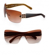 A sleek style with wood-print accented metal and acetate, logo temples. Available in black with grey gradient lens or brown with brown gradient lens. Wood-print accented metal and acetate, logo temples100% UV protectionImported