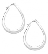 Subtle and stylish. A teardrop silhouette helps these large, flat hoop earrings reach the heights of elegance. Crafted from sterling silver. Approximate drop: 1-1/2 inches. Approximate diameter: 1 inch.