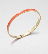 An enamel accented, 12k goldplated design with a hidden, engraved message. Enamel12K goldplated zincDiameter, about 2.5Slip-on styleImported 