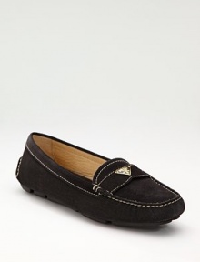 Suede flat with logo detail. Leather lining Padded insole Rubber sole Made in ItalyOUR FIT MODEL RECOMMENDS ordering one half size down as this style runs large. Suede flat with logo detail. Leather lining Padded insole Rubber sole Made in ItalyOUR FIT MODEL RECOMMENDS ordering one half size down as this style runs large.