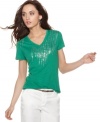 A shower of shimmering sequins gives an edge to Calvin Klein Jeans' classic V-neck tee!