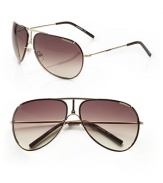 Classic, sleek frames in durable stainless steel. Available in gold with brown/grey gradient lens. Logo temples100% UV protectionImported