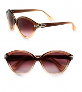 Iconic signature cable is subtly wrapped around the temples of this cat's-eye frame for a look of understated sophistication. Available in smokey quartz with brown-tan gradient lens. Cable accented temples100% UV protectionImported