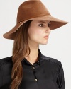 Asymmetric wide brim hat with leather and metallic O'Ring trim.Adjustable inner band One size fits most Brim, about 4 Rabbit hair Imported Please note: Sold with brush to maintain pile. 