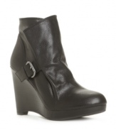 Max Studio's Avric wedge booties are a must-have for your fall shoe collection! With buckle hardware detailing and a stacked wedge heel, they're available in leather or suede. Wear them on weekends and add polish to even your most laid-back looks.