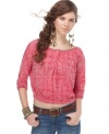 Beading trim adds a hint of shine to this Free People printed cropped top -- perfectly paired with light wash spring denim!