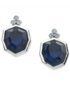 Stylish in silver. T Tahari puts a faceted blue Montana glass stone front and center, with light sapphire accents for a tranquil effect. The base of these stud earrings are crafted from silver-tone, nickel-free mixed metal. Approximate diameter: 5/8 inch.