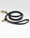 A leather-look leash as stylish as your little pup, complete with a golden heart charm. Adjustable buckle 60 long Polyurethane Imported 