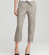 A clean silhouette and updated classic cargo details elevate these Eileen Fisher cropped linen pants. Pair with a billowy blouse and flats for effortlessly chic office attire.