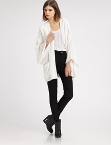 Inspired by the traditional kimono, this elegant topper is slightly oversized with wide bell sleeves and a stylish open front.Dropped shouldersWide kimono sleevesOpen frontHip patch pocketsSilk liningAbout 31 from shoulder to hemRayonMachine washImported Inspired by the traditional kimono, this elegant topper is slightly oversized with wide bell sleeves and a stylish open front.Dropped shouldersWide kimono sleevesOpen frontHip patch pocketsSilk liningAbout 31 from shoulder to hemRayonMachine washImported