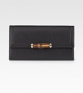 Continental wallet with bamboo detail in leather with light goldtone hardware.Snap closure Twelve card slots Two bill compartments Two separate interior compartments Zip coin pocket Fully lined 7½W X 4¼H X ½D Made in Italy